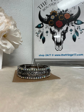 Close-up of the Iridescent Stoneflare Silvertone Bracelet, highlighting the mesmerizing iridescent stones that cast a kaleidoscope of color, ideal for western wear lovers.